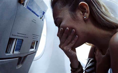 How to Survive Food Poisoning When You're on a Plane - Yahoo Life