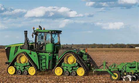 Deere beats second-quarter estimates on cost cuts, trims annual profit forecast