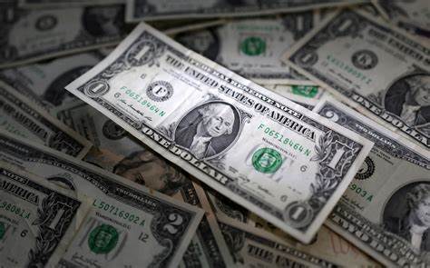Dollar dips with Treasury yields after Bessent pick - Reuters