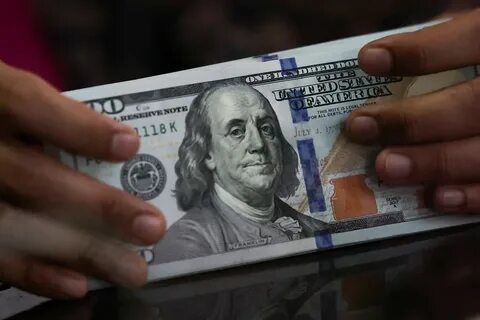Dollar advances against peers after strong US economic data