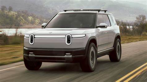 Tesla’s EV rival Rivian warns Trump’s trade war means it will sell fewer of its American-made cars than expected