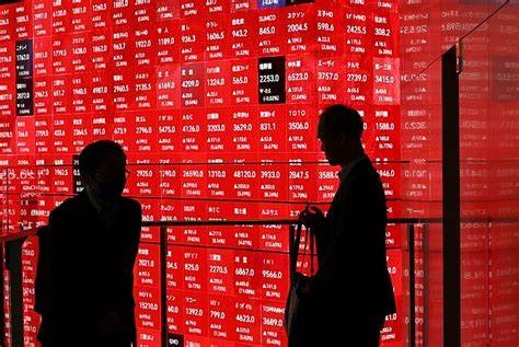 Stocks hit pause, dollar slips with China/US trade talks in focus