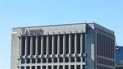 South Korea's central bank cuts borrowing costs to nurse the sluggish economy