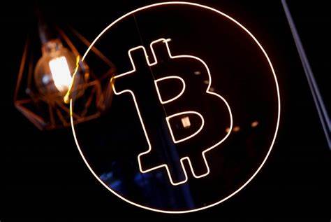 Regulators approve new bitcoin funds in move that could spur more investment in cryptocurrency - PBS NewsHour