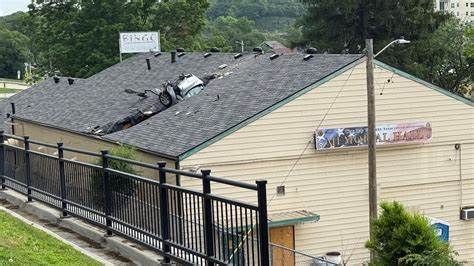 Two cars have crashed through this veterans hall’s roof in just 3 months — here are the insurance implications