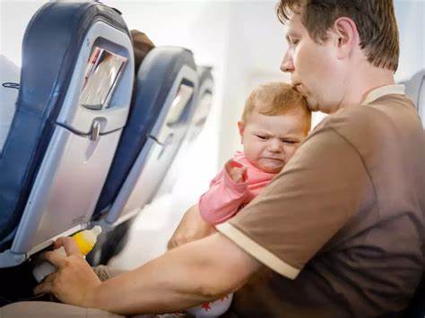 What to do about a screaming child on board, according to flight attendants - Business Insider