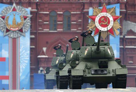Narva castle facing Russia hangs Putin-Hitler banner on Russia's 'Victory Day'