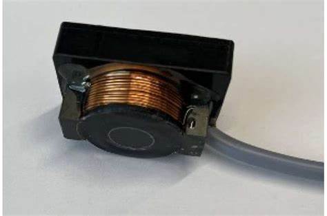 Nanoparticle-cell link enables EM wireless programming of transgene expression