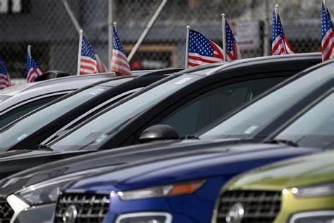 Car dealers shield buyers from tariff price hikes in April