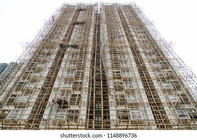 Hong Kong's Famous Bamboo Scaffolding Hangs on (For Now)