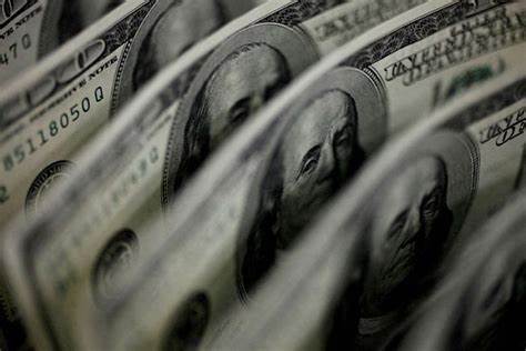 US dollar firms against peers after Fed holds rates steady - Reuters