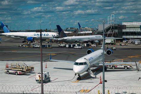 Top Stock Movers Now: United Airlines, Adobe, Halliburton, and More