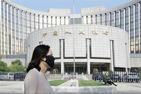 China central bank rolls over maturing loans, injects cash