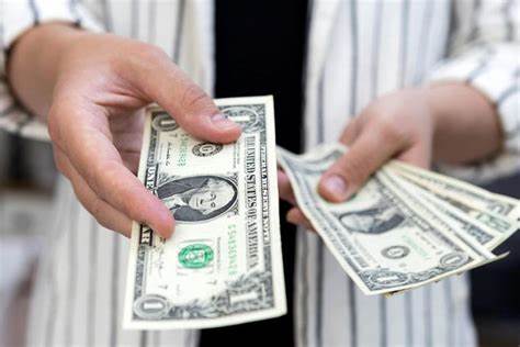 Dollar eases ahead of US payrolls test