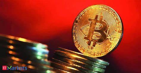 Bitcoin sinks 8% to four-month low, ether slides 9% - The Economic Times