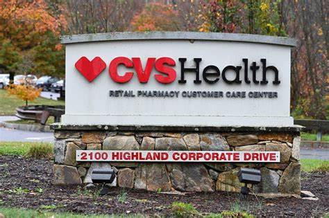 CVS raises profit forecast, to exit Obamacare market as turnaround gains steam