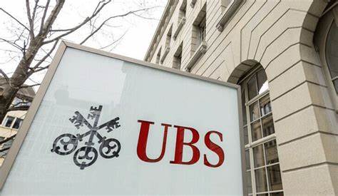 Analysis-Shaken by crises, Switzerland fetters UBS's global dream