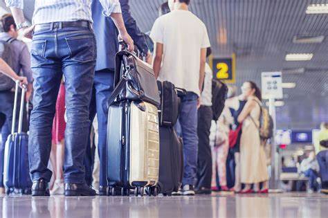 Why airlines make you check your carry-on bags - Vox.com