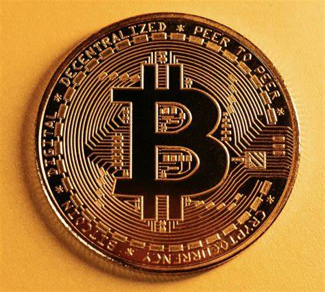 JPMorgan to Let Clients Buy Bitcoin but Won’t Custody Tokens, Dimon Says