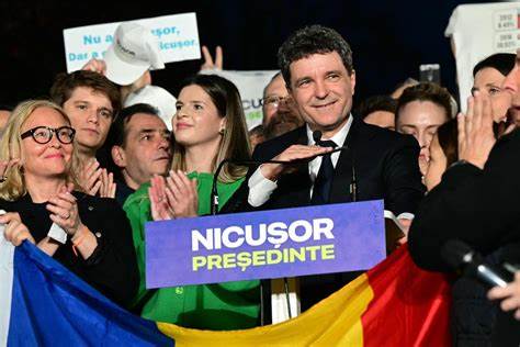 Romanian centrist ahead in presidential race, exit polls show