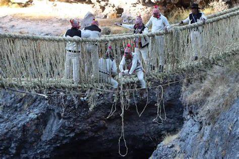 A man rebuilding the last Inca rope bridge