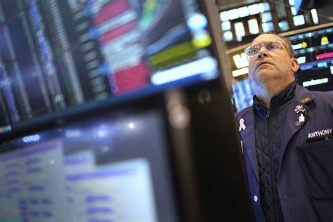 Wall Street storms back from early losses, echoing its manic moves through a historic April