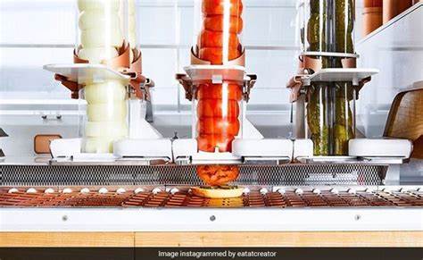 South Bay restaurant debuts burger-making robots