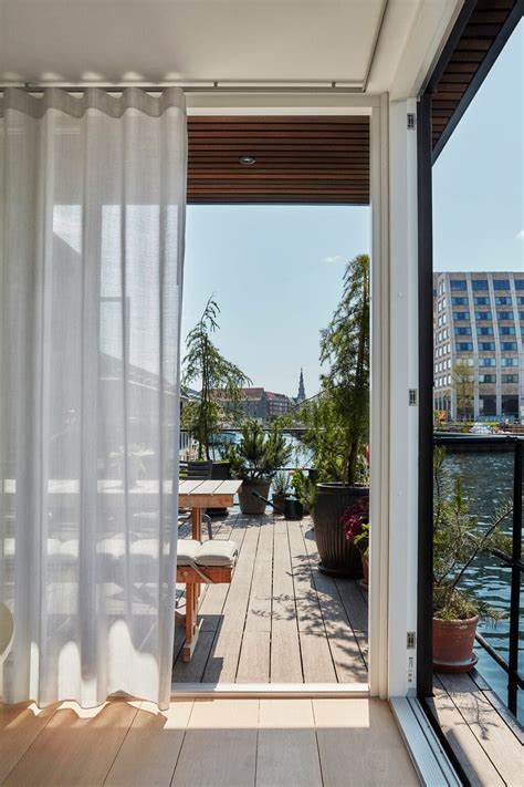 Søren Hvalsøe Garde's Modern Houseboat Anchors in Copenhagen