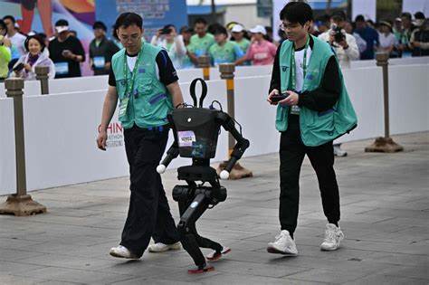 Humanoid robots stride into the future with first half-marathon