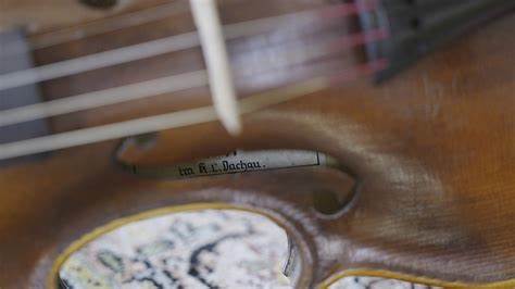 Secret note hidden in Dachau-built musical instrument found after 80 years