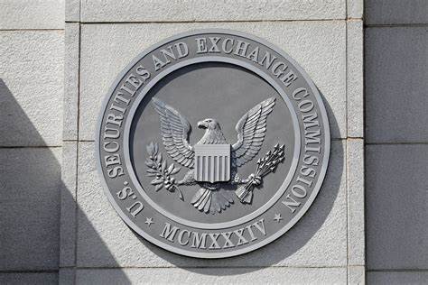 US SEC drops claims against two Ripple Labs executives - Reuters