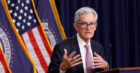 Fed hints at stagflation risks, holds rates steady amid tariff impact