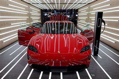 Porsche slashes outlook as US tariffs, China slump dim prospects