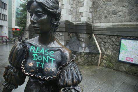 Front row? Dublin orders tourists to leave statue's cleavage alone