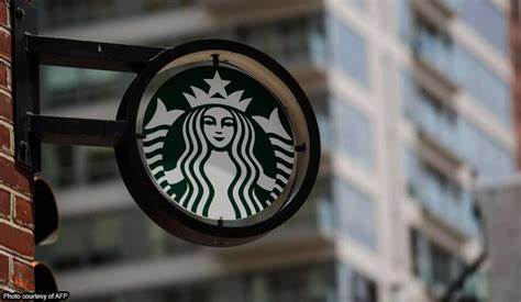 Starbucks to beef up store staffing, go slow on automation rollout