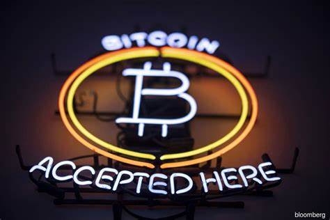 Bitcoin Touches One-Month Low as Glum Traders Hedge for Payrolls - BNN Bloomberg