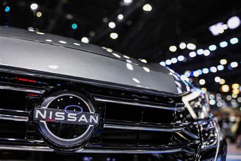 Nissan to cut over 10,000 more jobs, NHK reports