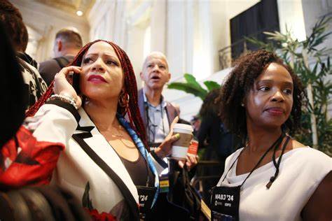 Harris strikes measured contrast with Trump's contentious appearance before Black journalists