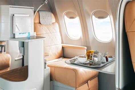 Paying for bespoke furniture versus paying for a business class flight (2020)