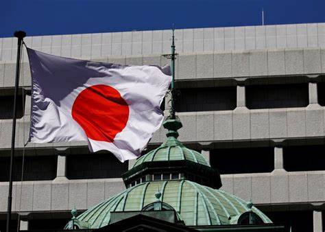 BOJ keeps rates steady, cuts growth forecasts on US tariff hit