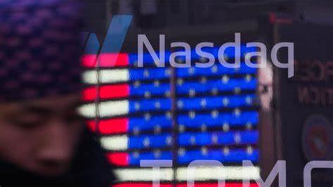 US stocks end down but off lows, waiting to see how Trump's new tariff threats shake out
